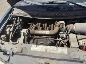 671.fd1496 Ford Windstar 1996 Coolant Reservoir 22778163