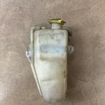 52079340 Coolant Overflow Reservoir For Jeep Cherokee Xj (91-01) Used. Price: $19.99.